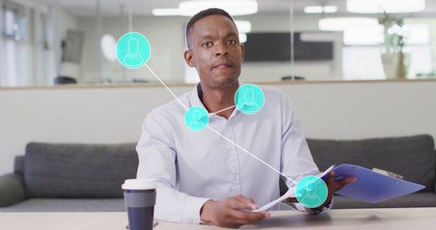 Businessman Analyzing Data With Digital Connections in Office - Download Free Stock Images Pikwizard.com