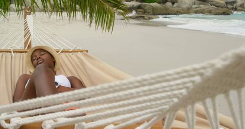 Relaxing African American Woman Sleeping Peacefully in Beach Hammock - Download Free Stock Images Pikwizard.com