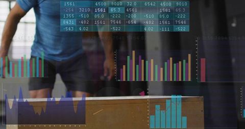 Athlete with digital performance analytics in gym setting