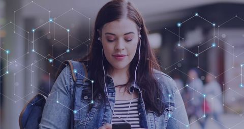 Connected Young Woman Using Smartphone with Digital Network Overlay