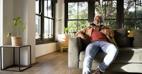 Senior Man Enjoying Leisure Time at Home