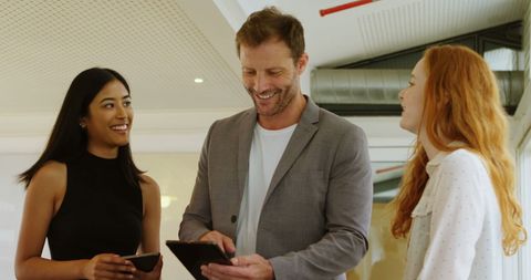 Collaborative Business Discussion with Colleagues in Modern Office