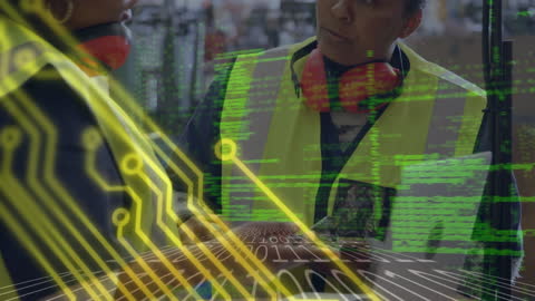 Warehouse Workers Analyzing Data Overlaid with Digital Circuit Board