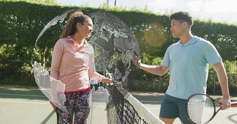 Smiling tennis players shaking hands at net with globe overlay for global sportsmanship