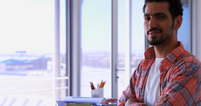 Confident Man Standing in Modern Office With Glass Windows - Download Free Stock Images Pikwizard.com