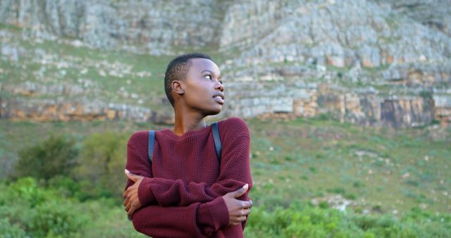 Confident Young Woman Amid Scenic Mountain Landscape - Download Free Stock Images Pikwizard.com