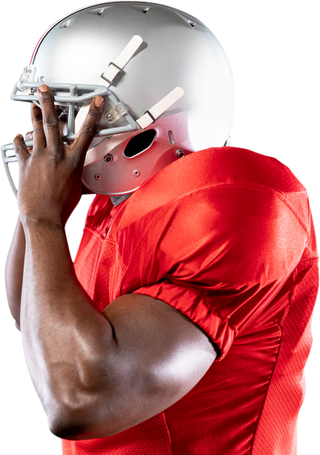 African American football player in red uniform adjusting helmet on transparent background - Download Free Stock Videos Pikwizard.com