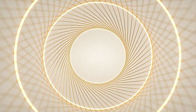 Golden spiral light sculpture with concentric rings and lattice shadows for minimalist decor