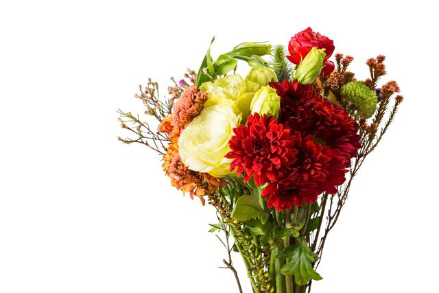 This vibrant flower bouquet features a mix of red, yellow, and orange flowers with green leaves, set against a white background. Ideal for use in floral design projects, greeting cards, wedding invitations, or as a decorative element in blogs and websites focused on nature, gardening, or celebrations.