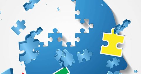 Blue Yellow Puzzle Pieces Floating on White Background