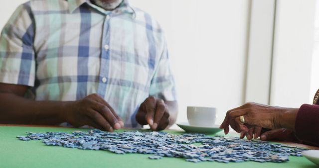 Image of happy senior african american couple doing puzzles - Download Free Stock Photos Pikwizard.com
