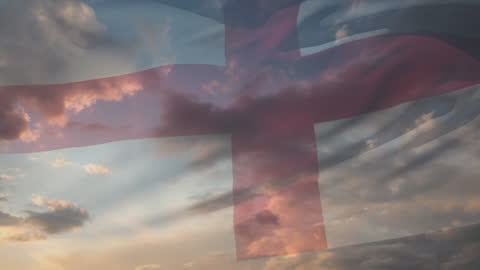 Flag of England Soaring Over Cloudscape at Sunset