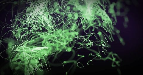 Abstract Green Glowing Light Trails on Dark Background