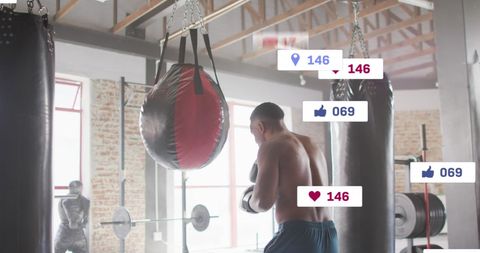 African American Boxer Training with Social Media Notifications