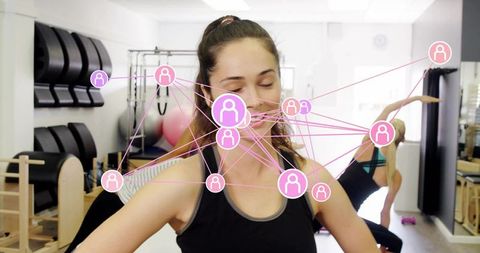 Woman Practicing Pilates with Social Network Overlay in Modern Fitness Studio