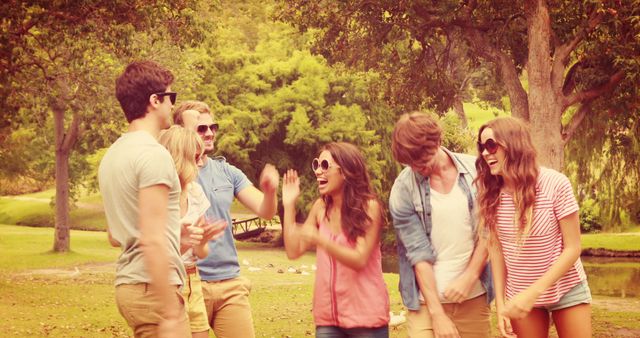 Group of Young Friends Enjoying Time Together in Park - Download Free Stock Images Pikwizard.com