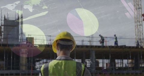 Architect Analyzing Construction Data at Busy Site - Download Free Stock Images Pikwizard.com
