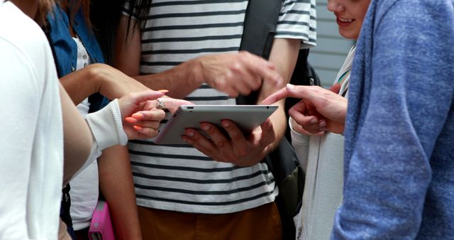 Group of Friends Discussing Over Tablet - Download Free Stock Images Pikwizard.com