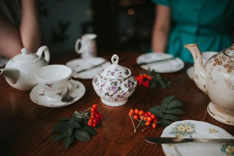Vintage tea set on rustic wooden table