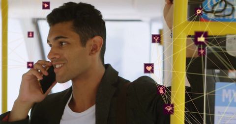 Man communicating on smartphone while traveling on bus with digital connectivity concept