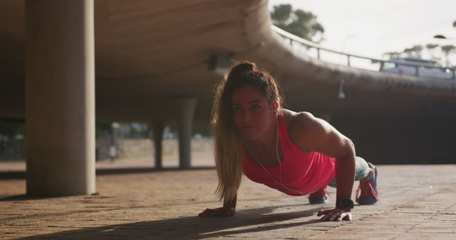 Fit Young Woman in Urban Setting Doing Push-Ups - Download Free Stock Images Pikwizard.com