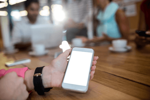 transparent smartphone screen displaying in cafe setting - Download Free Stock Videos Pikwizard.com