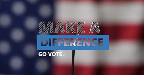 Sparkler igniting revealing american flag cutouts behind make difference go vote typography