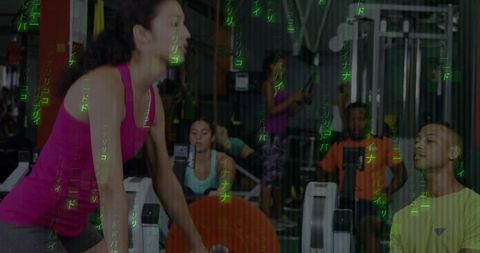 Female Athlete Preparing Barbell with Bright Orange Plates in Busy Gym Strength Session