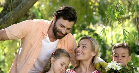 Happy Family Bonding Outdoors on a Sunny Day in Nature - Download Free Stock Images Pikwizard.com