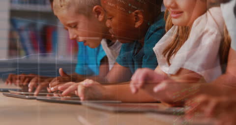Diverse Group of Children Using Tablets with Digital Graph Overlay