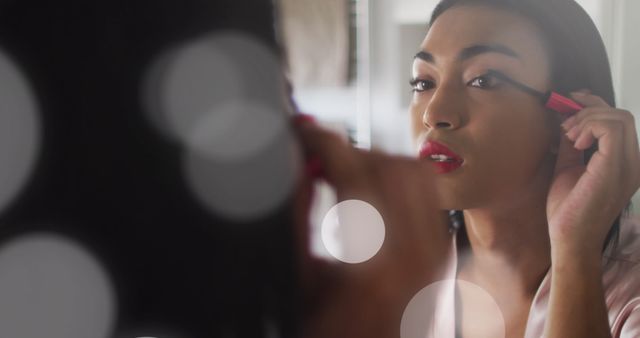 Biracial Woman Applying Mascara in Soft Light Close-Up - Download Free Stock Images Pikwizard.com