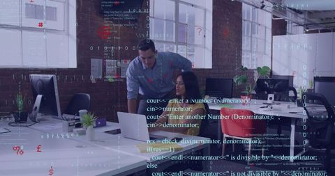 Coworkers collaborating on laptop with code overlay, modern loft office tech teamwork