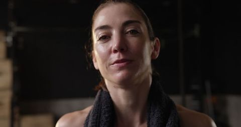 Sweaty Athletic Woman Gym Workout Close-Up Portrait with Towel