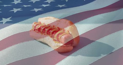 Juicy Hot Dog with American Flag Overlay
