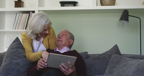 Senior Couple Enjoying Time Together with Laptop - Download Free Stock Images Pikwizard.com