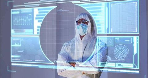 Scientist wearing protective coverall interacting with holographic ar data dashboard