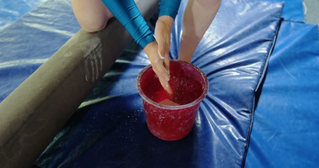 Gymnast Chalks Hands for Balance Beam Practice - Download Free Stock Images Pikwizard.com