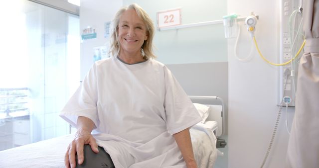 Senior Woman with Prosthetic Leg Smiling in Hospital Room - Download Free Stock Images Pikwizard.com