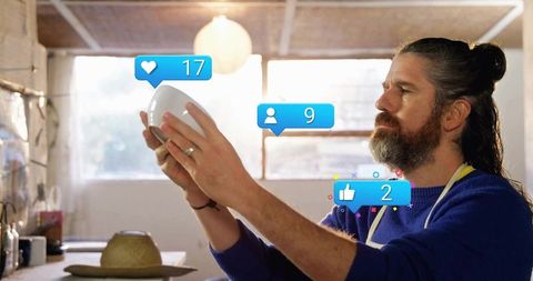 Artist Examining Ceramic Bowl in Pottery Studio with Social Media Icons
