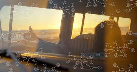 Relaxing Sunset View from Van with Digital Network Overlay