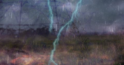 Dramatic thunderstorm with lightning over power lines