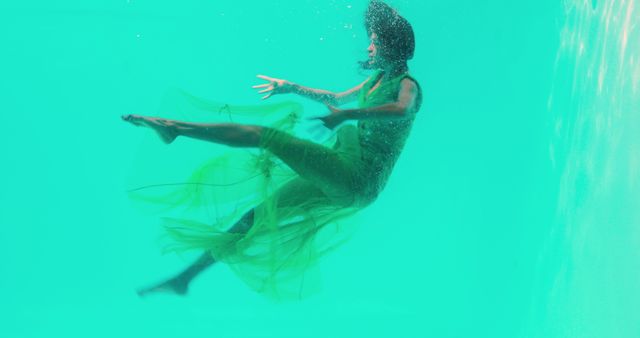 Underwater Ballet Movement in Green Dress - Download Free Stock Images Pikwizard.com