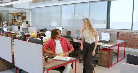 Office Birthday Celebration with Cake and Balloons