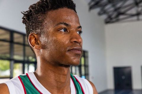 Focused basketball athlete preparing for game