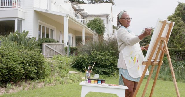 Senior Woman Painting Outdoors in a Garden - Download Free Stock Images Pikwizard.com