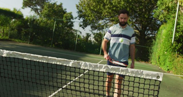 Man Practicing Tennis Solo on Outdoor Court - Download Free Stock Images Pikwizard.com