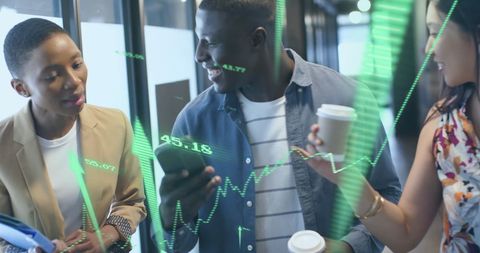 Multiracial team engaging with financial analytics in modern office