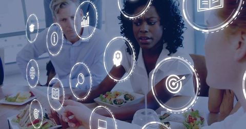 Business Professionals Brainstorming with Digital Icons Visuals