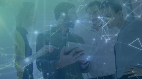 Diverse Business Team Exploring Digital Network with Tablet