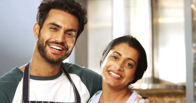 Smiling Couple Baking Together in Kitchen - Download Free Stock Images Pikwizard.com